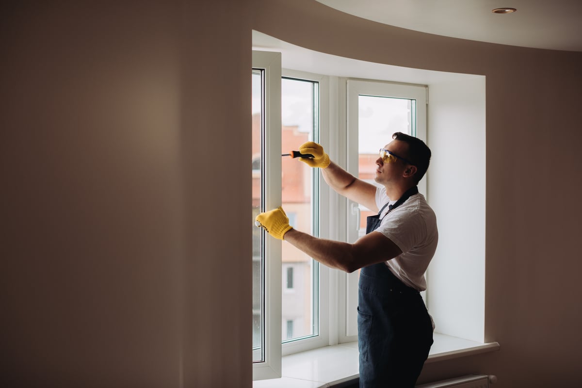 A maintenance worker in an apartment