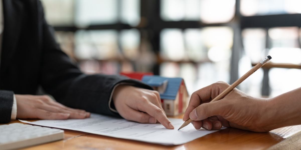 02 Real estate agent offer hand for customer sign agreement 02 Real estate agent offer hand for customer sign agreement